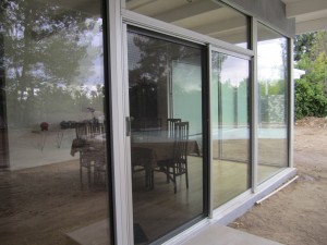 Clear Anodized Retractable Screen Door for a patio sliding screen door