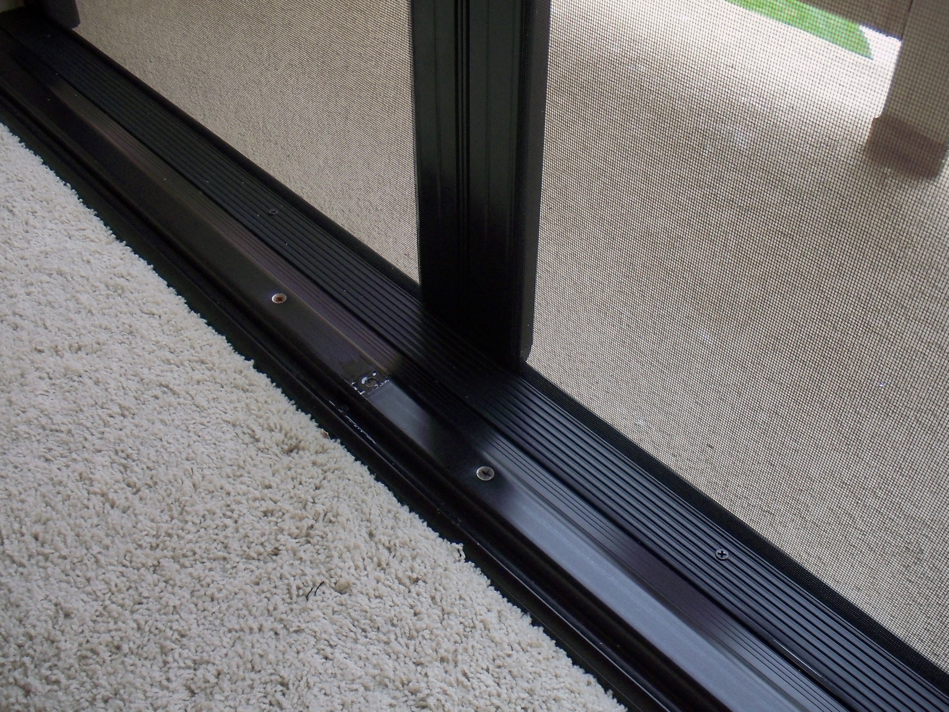 Bottom Sill and Rail for Double Set of Retractable Screen Doors